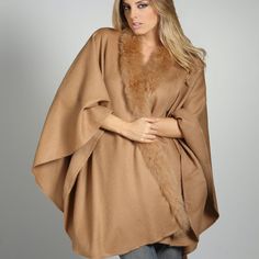 Looking for a gift that will make you feel special? For that good friend or someone special Beautifully woven, incredibly soft, with a silky-smooth texture. Our warm alpaca wool elegant capes are sure to chase the winter blahs away, available in different colors! Hand made in Perú with 100% baby alpaca; baby alpaca is one of the finest luxury fibers in the world. You won’t be just wearing a fashionable piece, but also some of Peru’s treasures and mysteries, reserved for Inca royalty. Alpaca wool Luxury Cashmere Shawl For Winter, Elegant Brown Merino Wool Outerwear, Elegant Beige Poncho, Elegant Solid Poncho For Fall, Elegant Beige Poncho For Fall, Elegant Alpaca Outerwear For Winter, Beige Alpaca Shawl For Fall, Elegant Alpaca Outerwear For Fall, Fall Beige Alpaca Shawl