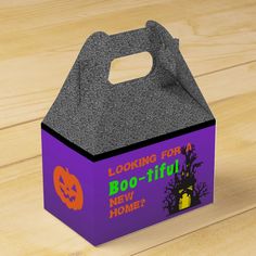 a halloween treat box on a wooden table