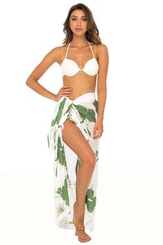 Island inspired white with black Hibiscus Bali sarong swimsuit cover up, gives you style and comfort at the beach, poolside, lounging on a hot summer day or on your next tropical vacation. Fringe on the edges give it a spirited bohemian feel. And the pretty sequins on the flower pistil brings a hint of sparkle to your beach look . Includes a coconut shell clip for easy tying; just put an edge of the fabric in the two holes and pull through for a perfect fit. Length can be adjusted by simply folding the garment down. One size fits most. Measures 67” x 45”. Made from 100% silky soft, breathable, easy care rayon. Rayon is moisture absorbent (more so than cotton), so this beach skirt will keep you cool and comfortable. Quick-drying rayon makes this the perfect beach wear for vacation or travel Sarong Clip, Flower Pistil, Black Hibiscus, Sarong Swimsuit Cover, Shell Clip, Floral Bathing Suits, Sarong Wrap, Skirt Coverup, Beach Skirt