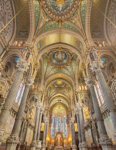 the interior of a cathedral with high vaulted ceilings