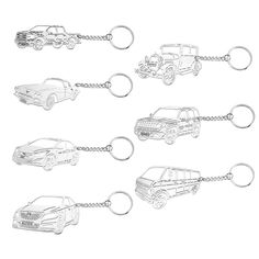 four different types of key chains with cars drawn on the front and back, all in various shapes