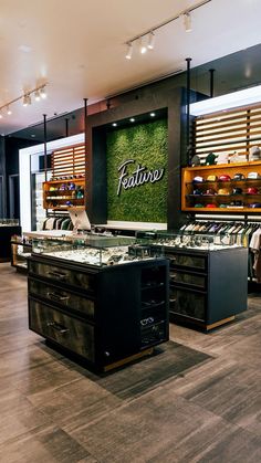 the inside of a jewelry store with lots of necklaces and watches on display in it