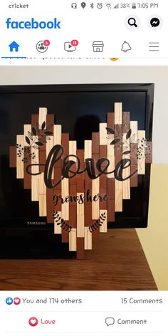 a wooden frame with the words love spelled on it