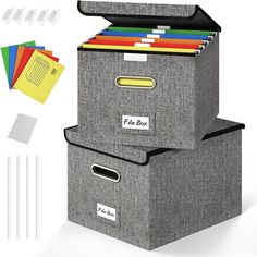 three boxes with files and file folders on top of each other, one has a clipboard in it