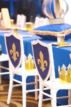 the chairs are decorated with blue and gold