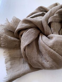 "Braun linen scarf is lightweight and medium soft. Stylish fashion trend for men's or women's outfits. Loved by fans of the classic style. Gift for her/ him. Dimensions: *SCARF size S 17\"x 76.5\" (43.50cm x 195cm ) *SCARF size L 26\"x 76.5\" (66.50cm x 195cm ) *Fabric weight 130 g/m². *pure washed linen. *will not shrink, because is prewashed in 60owater, so it is shrink-out. * washed and softened with original Marseille soap and emollients to preserve the best properties of natural linen flax Linen Scarf Outfit, Men Shawl, Scarf Photography, Marseille Soap, Linen Scarf, Classic Outfit, Linen Men, Scarf Outfit, Linen Scarves