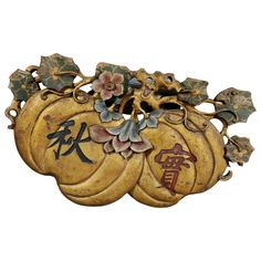 Depicting two large melons with calligraphy surmounted with lotus and flower and dragonfly. Painted in golds, reds, blues and green. Estate of John Volk, Palm Beach. Asian Sculptures, Blue Gray Paint, Chinese Decor, Metal Candlesticks, Painted Gourds, Carving Art, Music Room, Wood Panel, Art Furniture