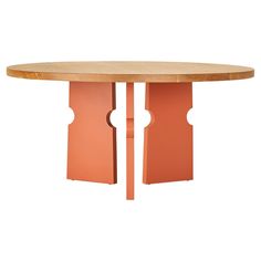 an oval wooden table with two orange dividers on each side and one section missing