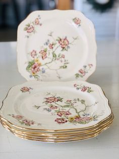 a stack of plates sitting on top of a table