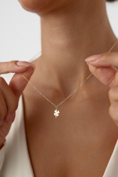 Four Leaf Clover Necklace | Dainty Lucky Clover Pendant | The Perfect Elegant Gift for Her! Bring a touch of luck and elegance to her jewelry collection with this stunning Four Leaf Clover Necklace. This dainty and timeless piece is crafted for those who appreciate both style and symbolism. Whether she wears it for luck or simply as a beautiful accessory, this tiny clover pendant will add charm to any outfit. 🍀 Why She'll Adore It: Symbol of Luck: The four-leaf clover is a universal symbol of good fortune, making this necklace a thoughtful and meaningful gift. Delicate Design: Its minimalist style ensures it's a perfect match for both casual and formal looks, adding just the right touch of elegance. High-Quality Craftsmanship: Made with attention to detail, this piece is designed to last 4 Leaf Clover Necklace, Symbol Of Luck, Meaningful Necklace, Clover Jewelry, Four Leaf Clover Necklace, Clover Pendant, 4 Leaf Clover, Clover Charm, Necklace Elegant