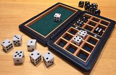 a board game with dices and tray on the table