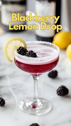 the blackberry lemon drop cocktail is garnished with blackberries