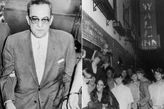 an old black and white photo of a man in a suit walking down the street