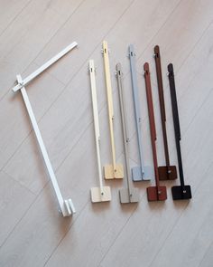 five different types of door handles on the floor