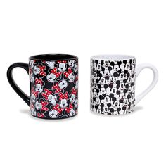 two coffee mugs with mickey and minnie mouse designs