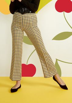 Designed in-house, these ModCloth namesake label trousers are made from a high-quality woven fabric that flaunts an exclusive yellow, black, and white-hued houndstooth plaid pattern. These high-waisted, vintage-inspired pants are so much fun to style thanks to their exclusive print. Boasting a 1940s-inspired ankle-skimming silhouette, these wide-leg trousers have pintuck detailing and a hidden zip closure and pair perfectly with our oh-so-retro Suit Yourself Vest. 89% Polyester, 9% Viscose, 2% S Vintage Style Swimwear, Gingham Embroidery, Retro Suits, Yellow Checkered, Shades Of Ivory, Bridesmaid Outfits, Casual Dresses Plus Size, Trousers Outfit, Shade Of Yellow