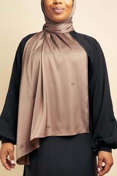 Let your light and beauty shine in our pretty Satin Gem Hijabs. Made with lustrous sateen fabric, a hint of stretch and light sparkles to give you a radiant glow and touch of shimmer. The ample size gives you more than enough fabric for full coverage. Perfect for ladies night or dinner with the hubs, you can't miss with these pretty hijabs. Made with luxuriously soft sateen fabric Lightweight and smooth to the touch (no grain) Embellished with pretty, sparkly colored crystal stones Measurements: More Than Enough, Crystal Stones, Ladies Night, Color Crystal, Stones And Crystals, Mocha, Grain, Gems, Satin