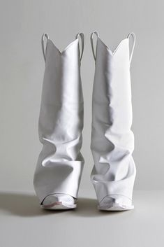 Mid Cowboy Boot with white leather toe and white leather sleeve. Two inch heel with pointed toe. Color: White Tall Cowboy style boot 100% Leather sleeve Made in Italy R13S0107-S002A This style runs slightly small. If in between sizes, we recommend sizing up. White Cowgirl Boots, White Goth, Fold Over Boots, White Cowboy Boots, Fashion Cowboy Boots, Open Toe Boots, Preformance Outfits, Cowboy Outfits, Futuristic Fashion