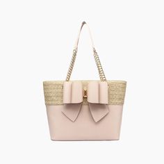 Best of both words, this bow dual vegan leather tote bag is your next go-to beach or picnic bag. Adorned with a chic bowtie ornament and spacious interior for storing all your essentials for a full Summer day. 100% Vegan Leather 16"W * 11 1/2"H * 6"D 11" Dual chain link top handle Zipper closure 37.53 oz Style# T9CX09 Preppy Bags, Vegan Tote Bag, Vegan Leather Tote Bag, Straw Tote Bag, Vegan Leather Tote, Picnic Bag, Straw Tote, Summer Day, White Bag