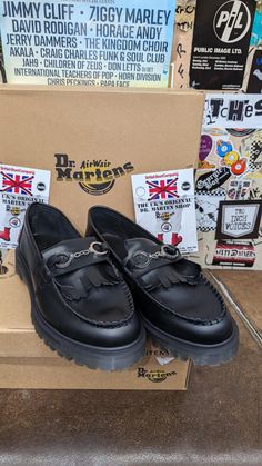 These are a modern made pair of Dr Martens loafers. They have been made in Thailand and are a nice limited edition version. They are finished in a black smooth leather and have a silver chain going across the instep. The chain on the left foot is slightly out of sync, please refer to photos but this won't affect the wear in any way. They have a darker commando sole unit which compliments the shoe perfectly... They are a UK size 9, European 43, USA men's 10 Martens Loafers, Dr Martens Loafers, Zeus Children, Dr Martens Adrian, Dr Martens Men, London In December, Ziggy Marley, Mens Shoes Boots, Black Chain