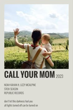 a woman holding a baby in her arms with the words call your mom on it