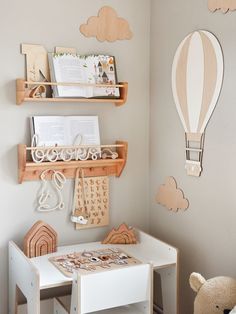 a child's playroom with toys and books