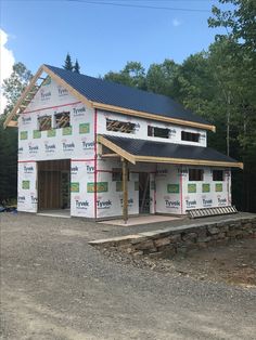 a house under construction in the woods