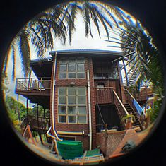 an image of a house taken through a fish eye lens