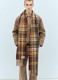 Plaid fringe scarf in wool-blend with logo patch at hem. Logo patch at hem Plaid Rectangular construction Fringe trims Made in Italy 41% Wool, 27% Nylon, 22% Silk, 8% Cotton, 2% Polyester Color: Brown Code: CA0325 700 SKU: acn0156030brn Our Products Are 100% Genuine. In All Cases We Stand By The Authenticity Of Every Product Sold On Our Site. Brown Wool Casual Scarf, Casual Brown Wool Scarf, Casual Wool Scarves For Fall, Brown Cotton Scarves For Fall, Casual Brown Scarf For Fall, Cotton Scarves For Fall, Casual Plaid Wool Scarf, Casual Wool Plaid Scarves, Acne Studios Men