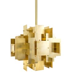 a gold colored chandelier hanging from a ceiling fixture with square and rectangle shapes