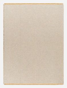 a beige area rug on a white background