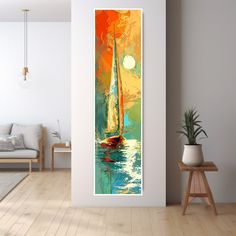 an abstract painting of a sailboat in the ocean on a white wall next to a wooden floor