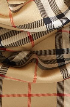 The twill weave adds perfectly placed texture to the screenprinted Burberry check patterning on this square silk scarf. 35" square 100% silk Dry clean Made in Italy Burberry Shawl Wraps, Burberry Pattern, Chanel Scarf, Silk Twill Scarf, Square Silk Scarf, Twill Weave, Plaid Fabric, Burberry Women, Sand Color