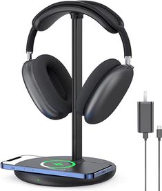 the wireless headset is connected to an external charger and plugged into a charging station