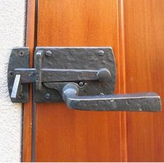 a door handle on a wooden door