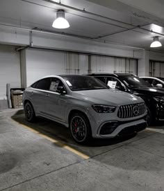 several cars are parked in a parking garage