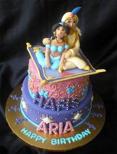 a birthday cake with an image of two women on top and the words aria happy birthday