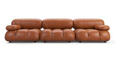 a brown leather couch with two reclinings on it's legs and one end facing