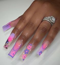 Purple Nails With 3d Flowers, Purple Extra Nails, Purple Acrylic Nails With 3d Flowers, Extravagant Purple Nails, Pink And Purple Long Acrylic Nails, Colourful Acrylic Nails, French Tip Gel Nails, Gel Acrylic Nails, Red Acrylic Nails