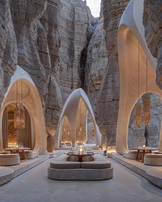 the interior of an indoor restaurant with mountains in the background