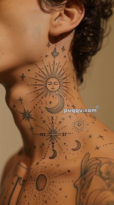 the back of a woman's neck with stars and moon tattoos on it,