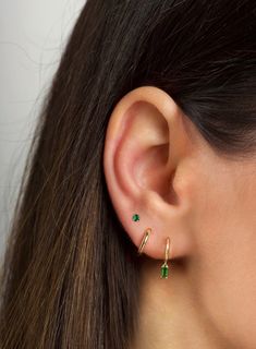 "The tiniest little studs for the most understated sparkle. Simple and dainty, they're perfect for layering with other dainty hoops and studs when you have multiple piercings. ∙ Available with emerald green, blue or purple cz stones. All options are available on the dropdown menu. ∙ Sold individually (1 stud) or by pair (2 studs) PLEASE NOTE - These are very tiny. * D E T A I L S * ∙ Material:  .925 Sterling Silver or 18K Gold Plated over .925 Sterling Silver  ∙ Stone: Green, Blue or Purple cz s Stacked Lobe Ear Piercings Simple, Earring Two Holes, Blue Ear Piercings, Third Hole Piercing, Minimalist Everyday Huggie Earrings With Birthstone, Minimalist Huggie Birthstone Earrings, Minimalist Birthstone Huggie Earrings, Minimalist Birthstone Earrings, Simple Internally Threaded Jewelry For Everyday