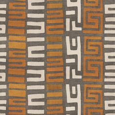 an orange and grey pattern on fabric