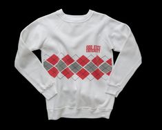 1980s vintage Ohio State raglan sweatshirt by Champion. Based on our hand measurements, the recommended modern unisex size for this garment is XS. HOWEVER, you should review the garment's actual measurements provided in the photos prior to purchasing. To ensure correct fit, we recommend comparing those measurements with the measurements of a similar garment in your closet. Retro Cotton Sweatshirt With Screen Print, White Retro Sweatshirt, White Retro Cotton Sweater, Retro White Crew Neck Sweatshirt, Retro White Sweatshirt With Ribbed Cuffs, Retro Cotton Sweater With Relaxed Fit, Retro College Sweatshirt With Screen Print, Retro Cotton Sweatshirt With Graphic Print, White Retro Crew Neck Sweater