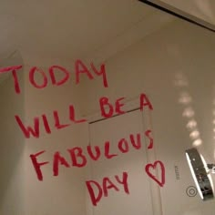 a bathroom mirror with writing on it that says today will be a fabulous day in red