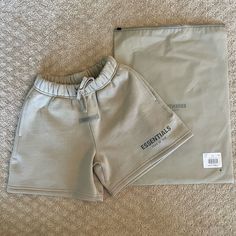 Fear Of God Essentials Sweat Shorts. Size Small-6/7 But Very Oversized Fit So Work For Larger Sizes As Well. Color Is Tan. Nwt. Authentic, Proof Of Purchase From Pacsun. Smoke And Pet Free Home. Shorts For Sleeping, Essential Shorts Outfit, Essentials Outfit, Essentials Pants, Essentials Shorts, Essential Shorts, Essentials Clothing, Tan Shorts, Essentials Set