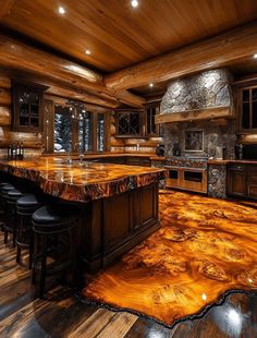 a large kitchen with wooden cabinets and marble counter tops