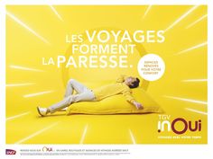 a man laying on top of a yellow pillow with the words les voyages forment lapresse