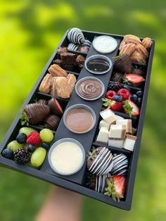 a tray filled with lots of different types of food