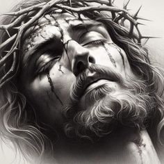 the face of jesus with crown of thorns on his head and nails in his hair